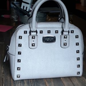 Grey studded Michael Kors mini cross body